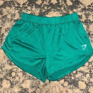 green gymshark shorts